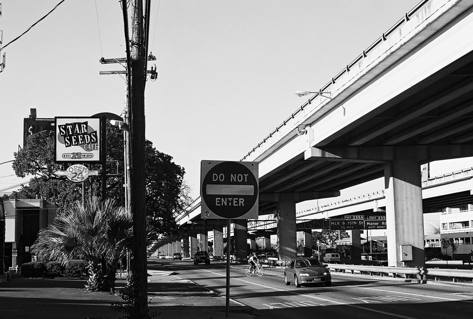 Cherrywood's west edge on the Interstate 35 frontage road in Austin, by the Star Seeds Cafe sign