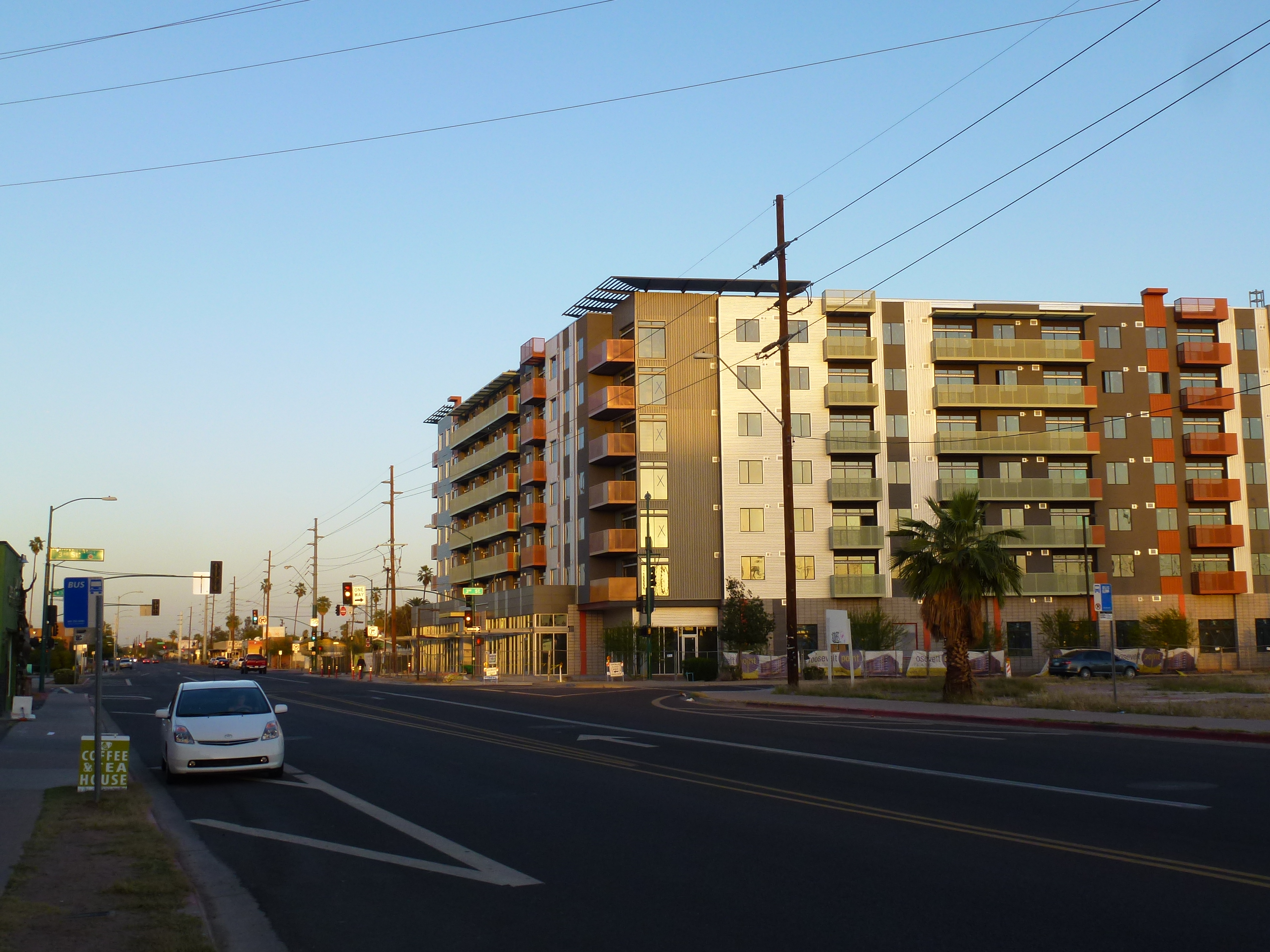 A Sunday evening on Roosevelt Row in Phoenix, with a mural covered wall in dusk light